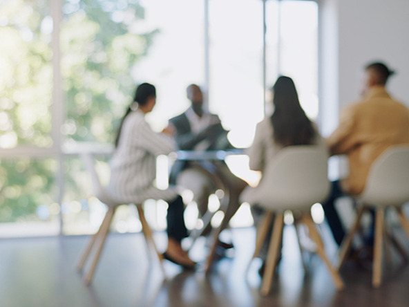 Blurred meeting business conversations meeting room professionals jun26_crop